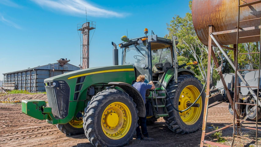 Breeza, Australia - May 6, 2015. A tractor being refuelled on a farm.